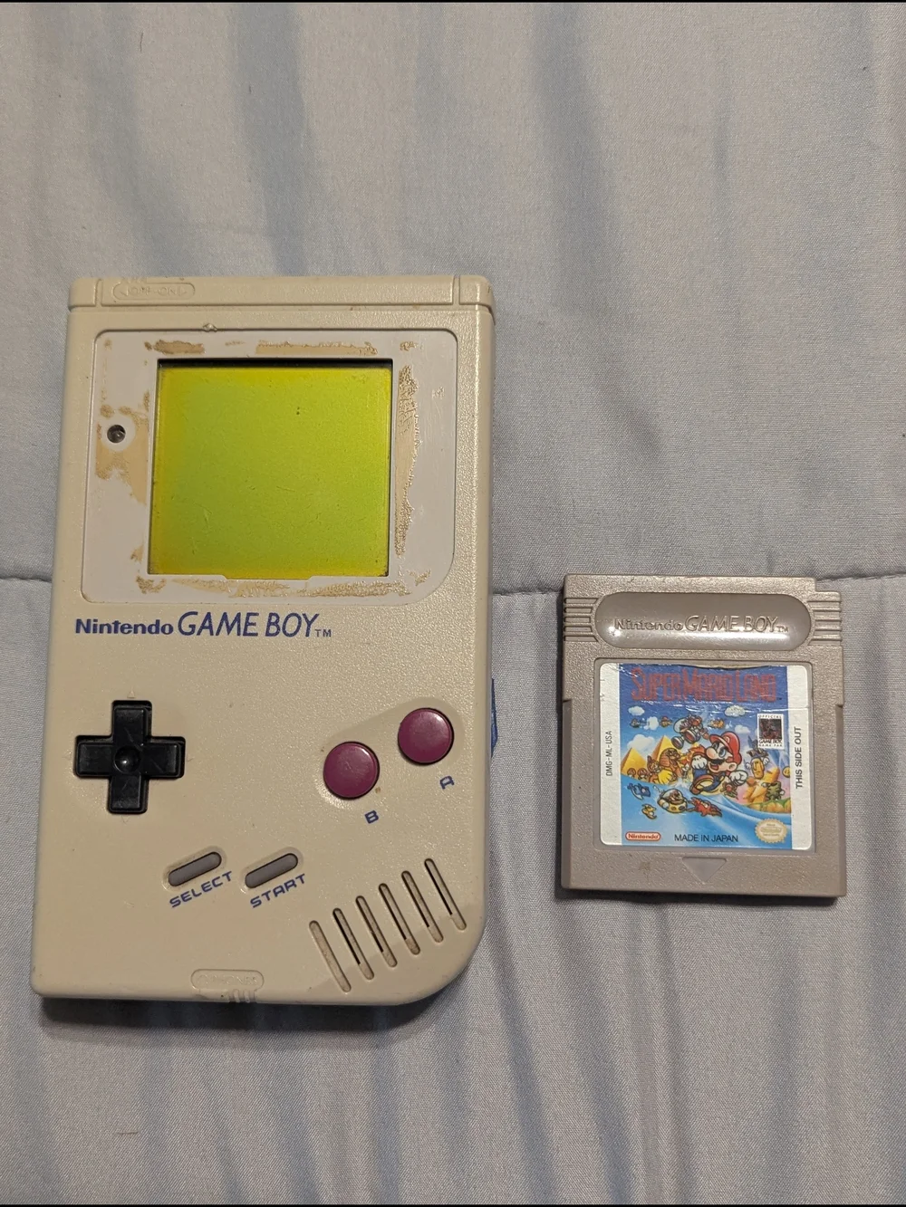 Nintendo Game Boy Portable in Cream with Purple Buttons